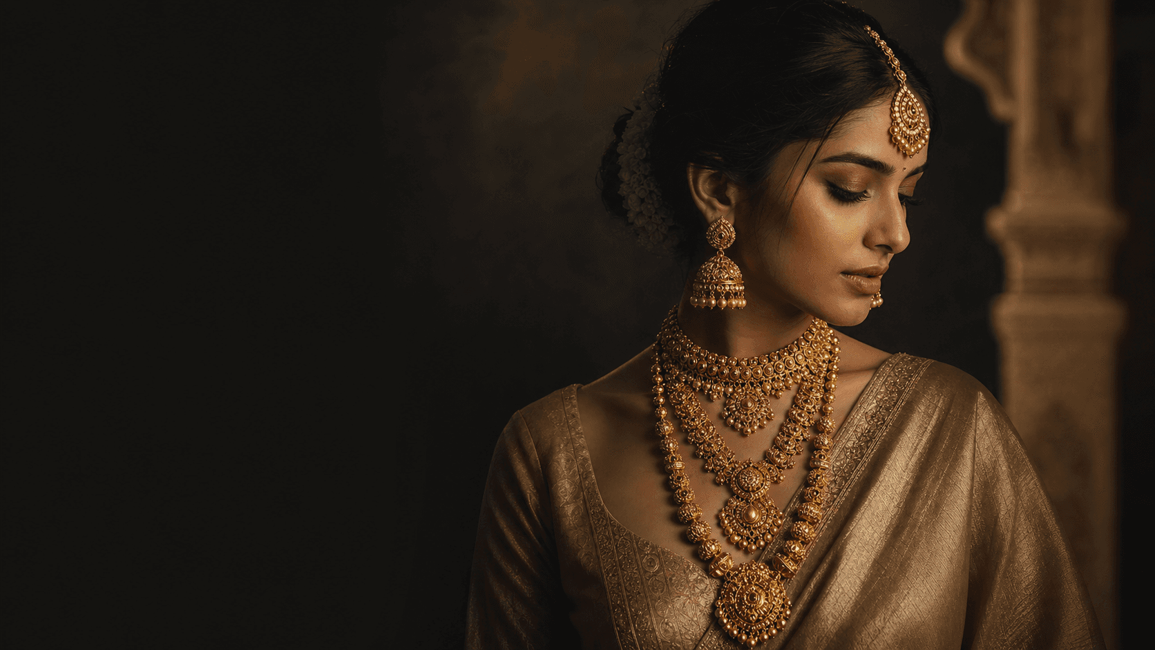 Woman wearing handcrafted Sumit Jewellers gold jewellery